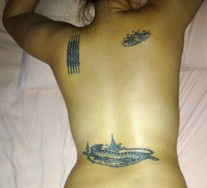 masseuse's tattoos